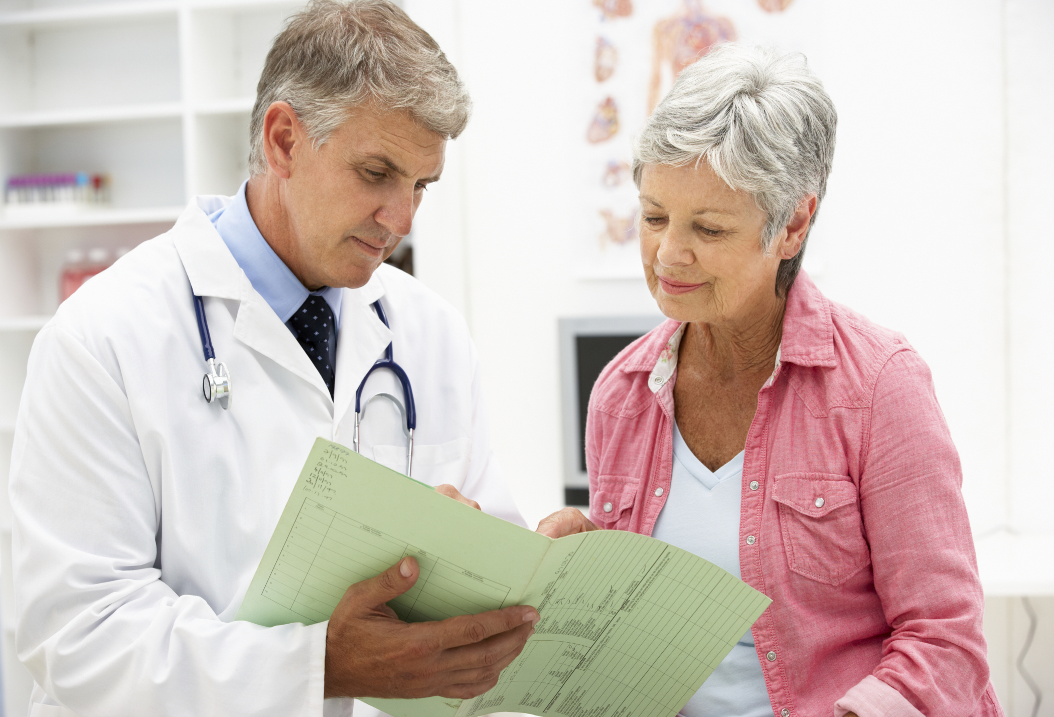 This is a picture of a senior woman speaking with a Doctor.
